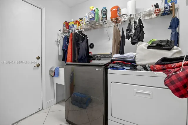 a storage room with washer and dryer
