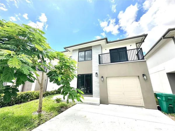 a house view with a outdoor space