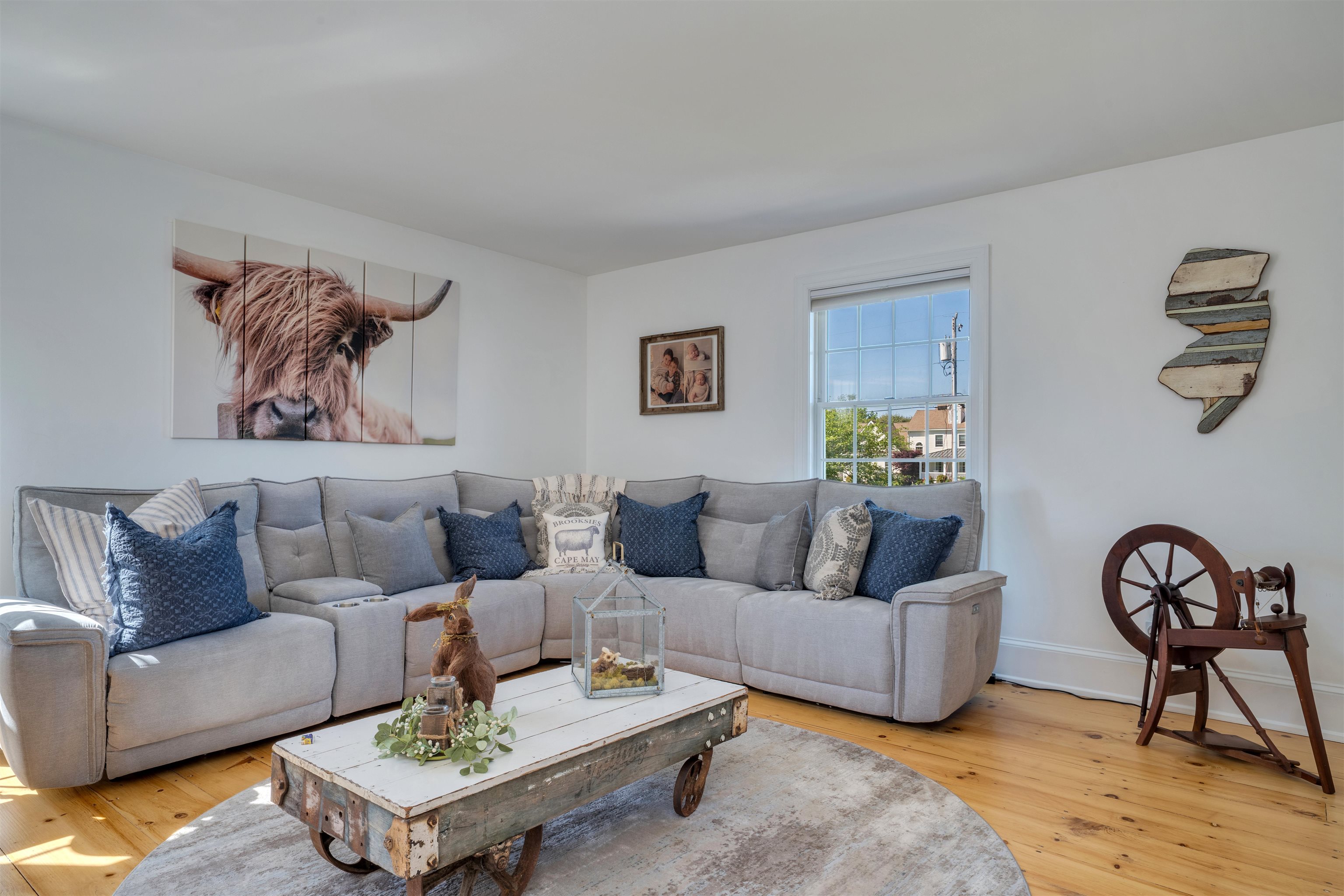 892 Weeks Landing Road Erma, NJ 08204 - Photo 19 of 50 a living room with furniture a rug and a wall painting