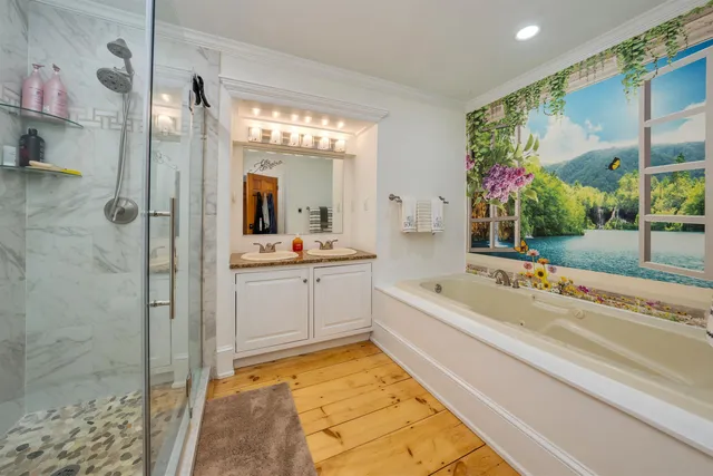 a bathroom with a toilet and a shower