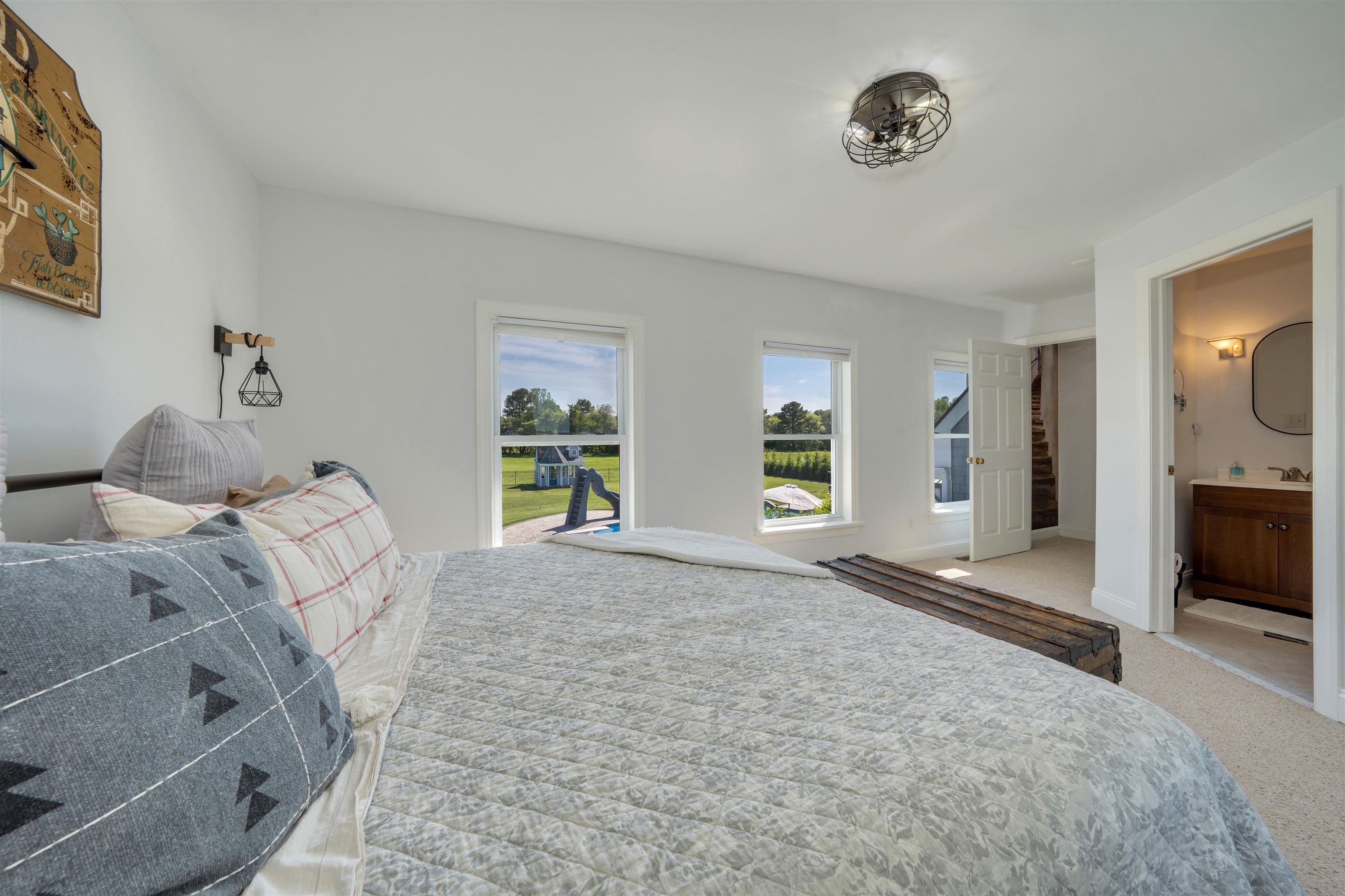 892 Weeks Landing Road Erma, NJ 08204 - Photo 35 of 50 a spacious bedroom with a bed and a stove top oven