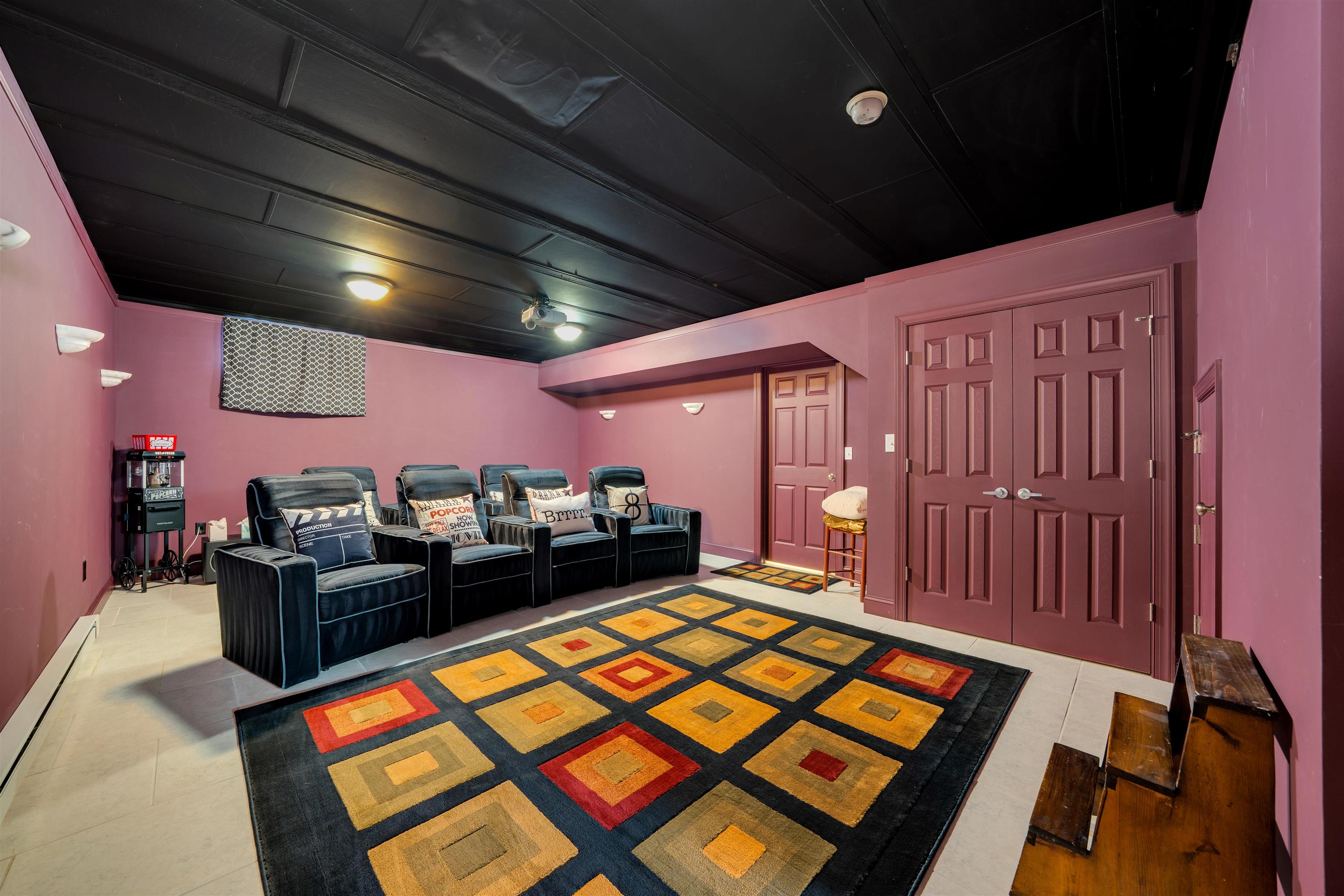 892 Weeks Landing Road Erma, NJ 08204 - Photo 40 of 50 a living room with furniture a flat screen tv and a rug