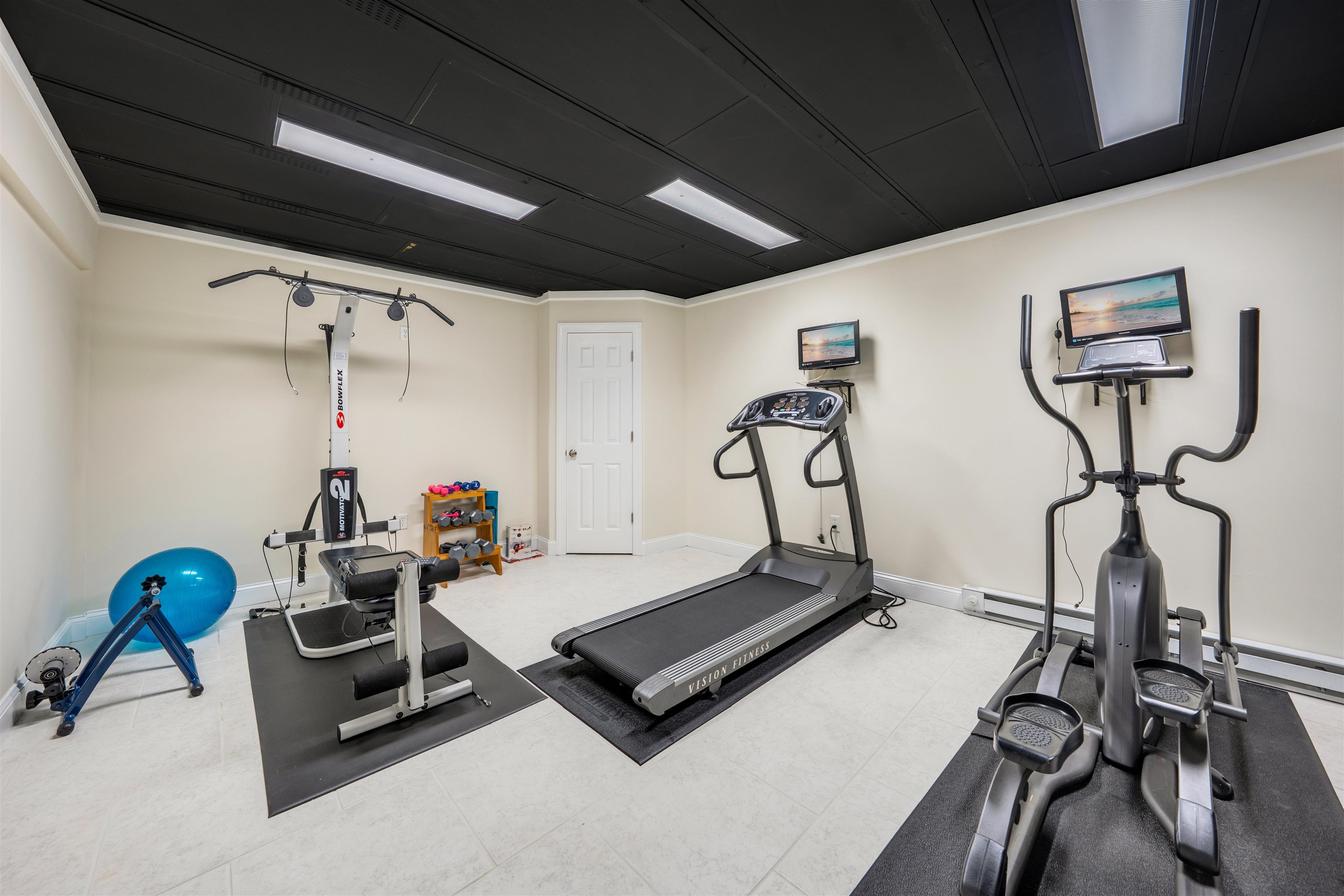 892 Weeks Landing Road Erma, NJ 08204 - Photo 41 of 50 a room with gym equipment and windows