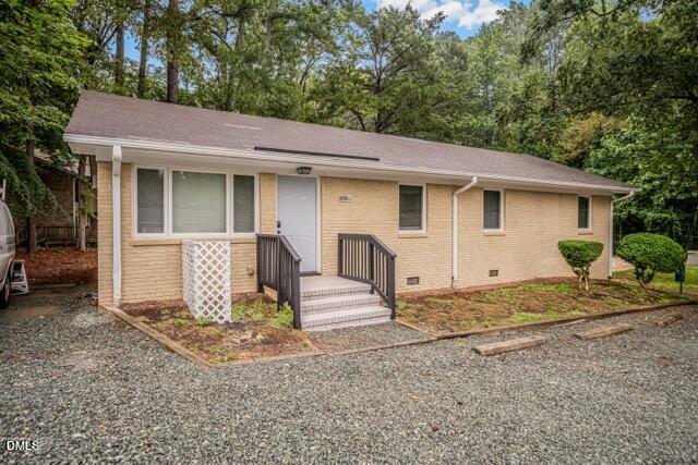 201 Howell Street, Unit 100A Chapel Hill, NC 27514 - Photo 1 of 22 a view of a house with a patio and backyard