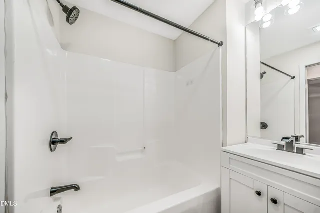 a bathroom with a sink and a bathtub