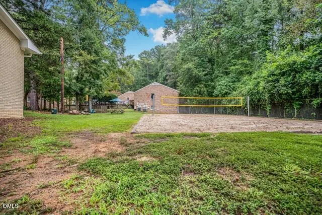 a house view with a garden space