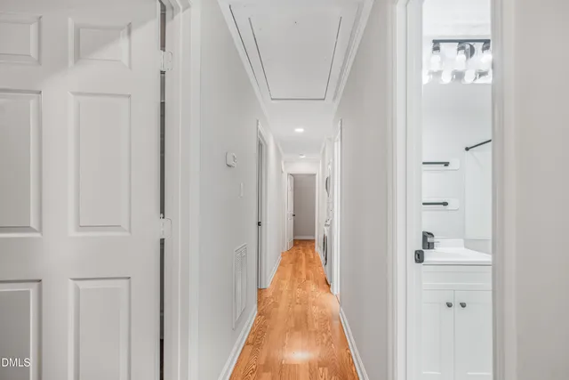 a view of a bathroom from the hallway