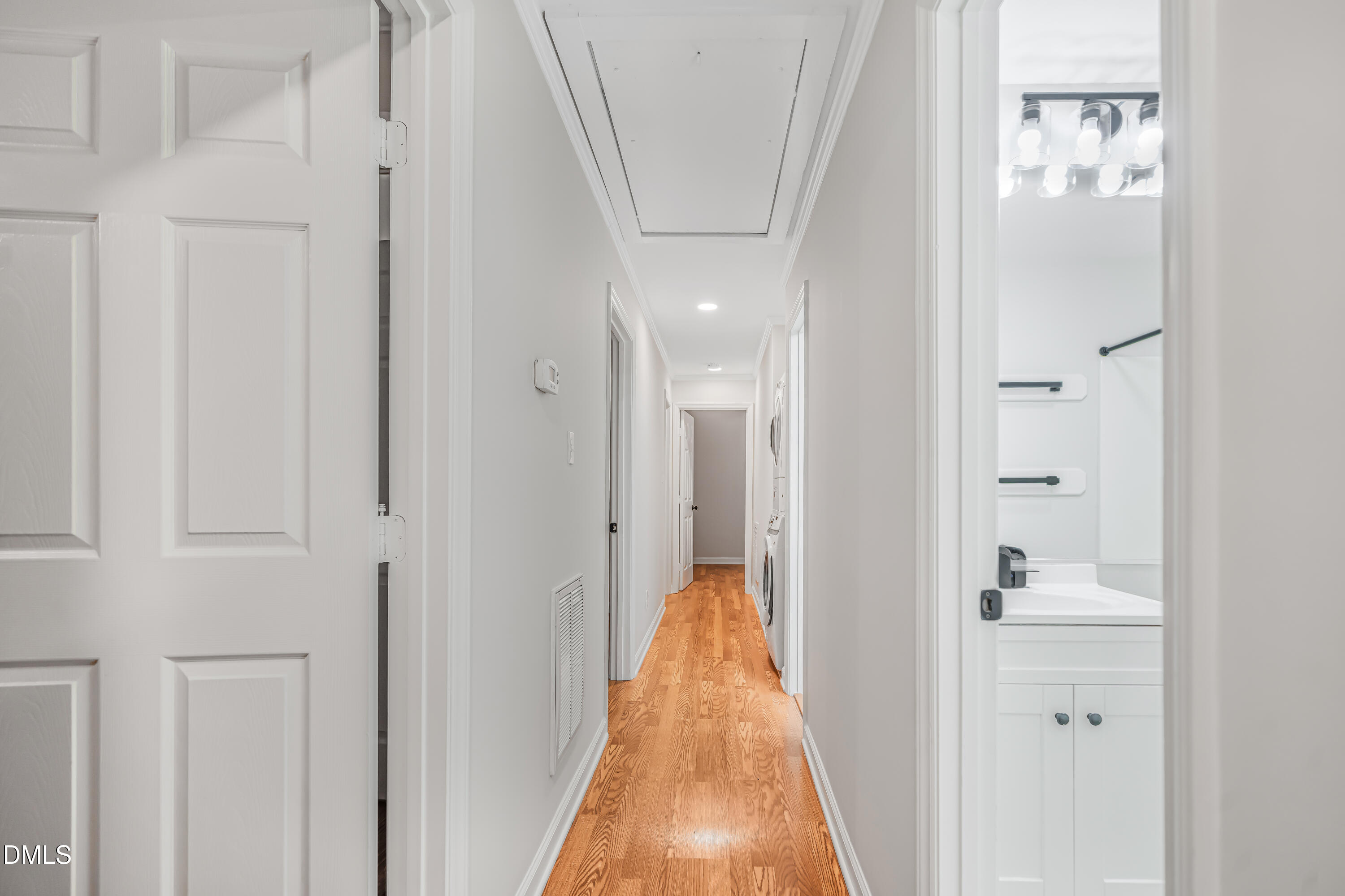 201 Howell Street, Unit 100A Chapel Hill, NC 27514 - Photo 7 of 22 a view of a bathroom from the hallway
