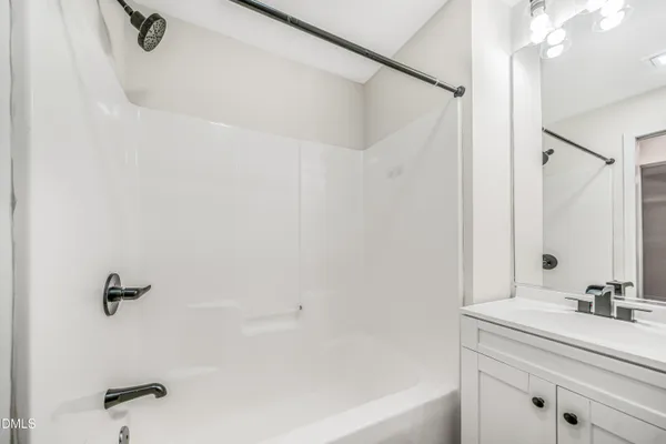 a bathroom with a sink and a bathtub