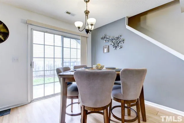 a kitchen with stainless steel appliances a refrigerator sink microwave and stove