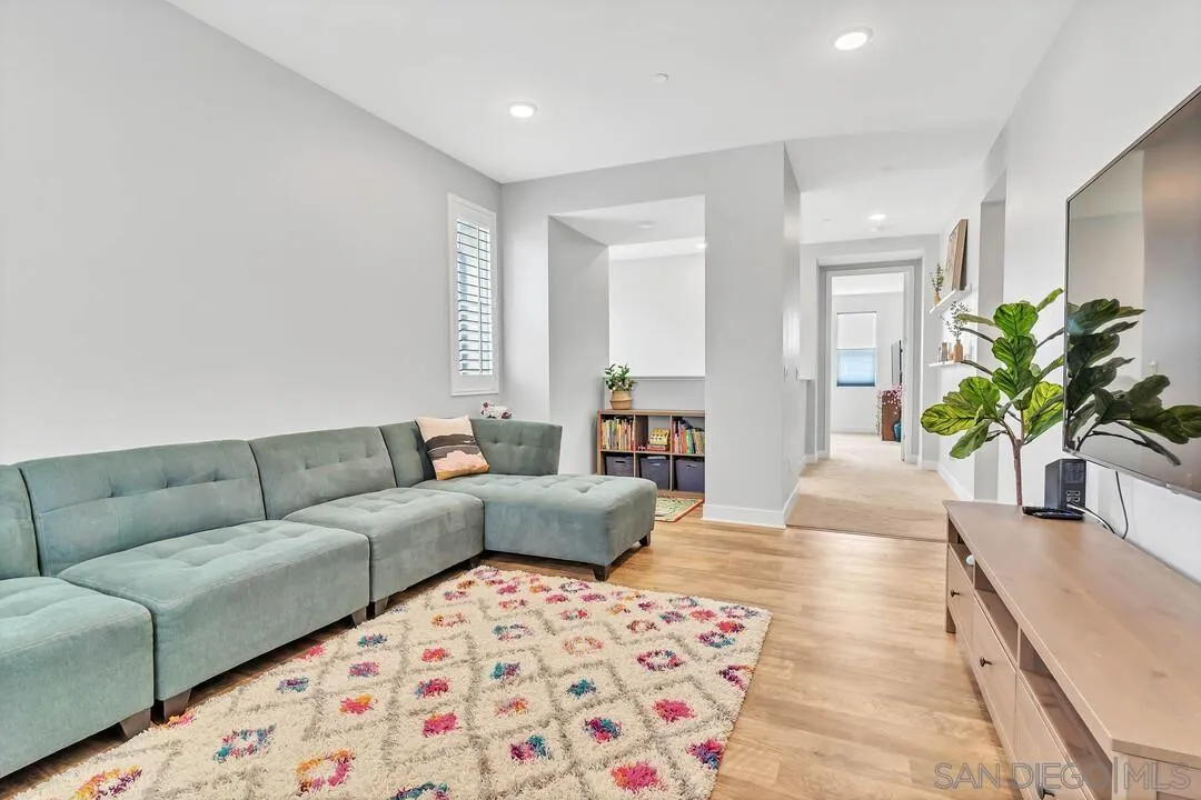 8869 Trailridge Avenue Santee, CA 92071 - Photo 13 of 48 a living room with furniture and a potted plant