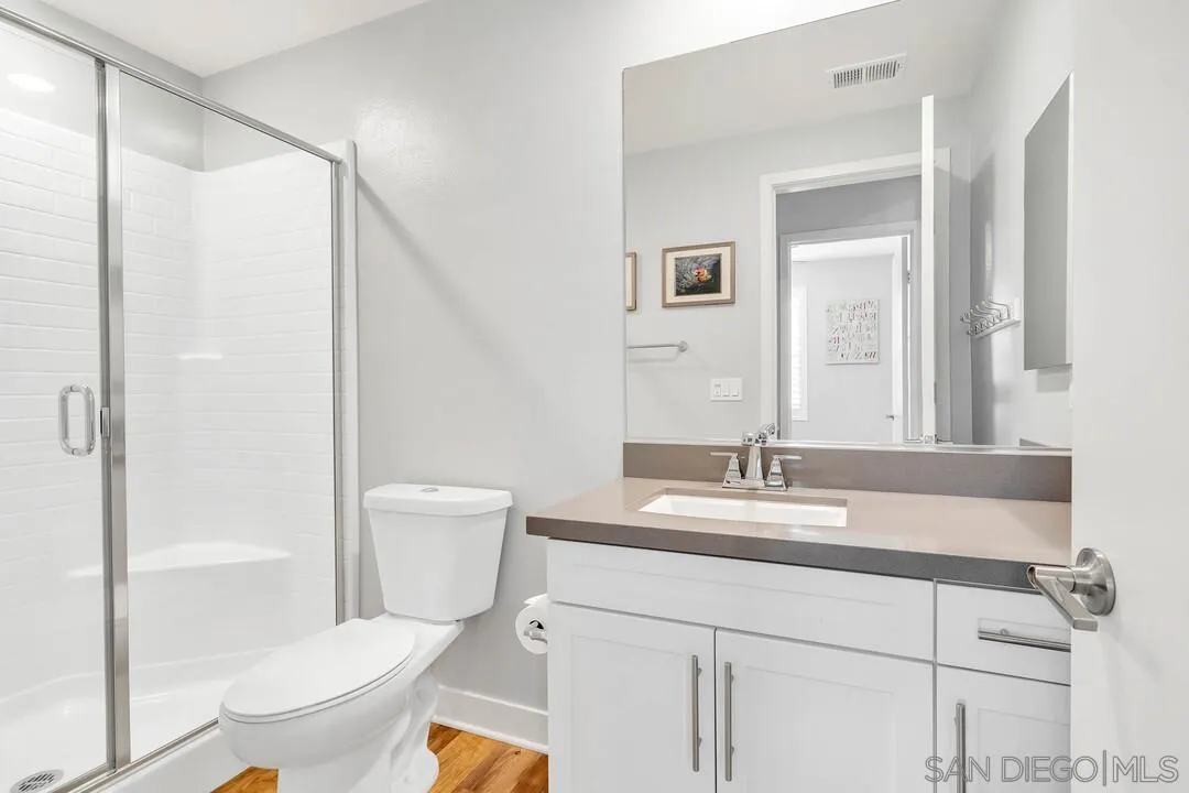 8869 Trailridge Avenue Santee, CA 92071 - Photo 24 of 48 a bathroom with a sink and a mirror
