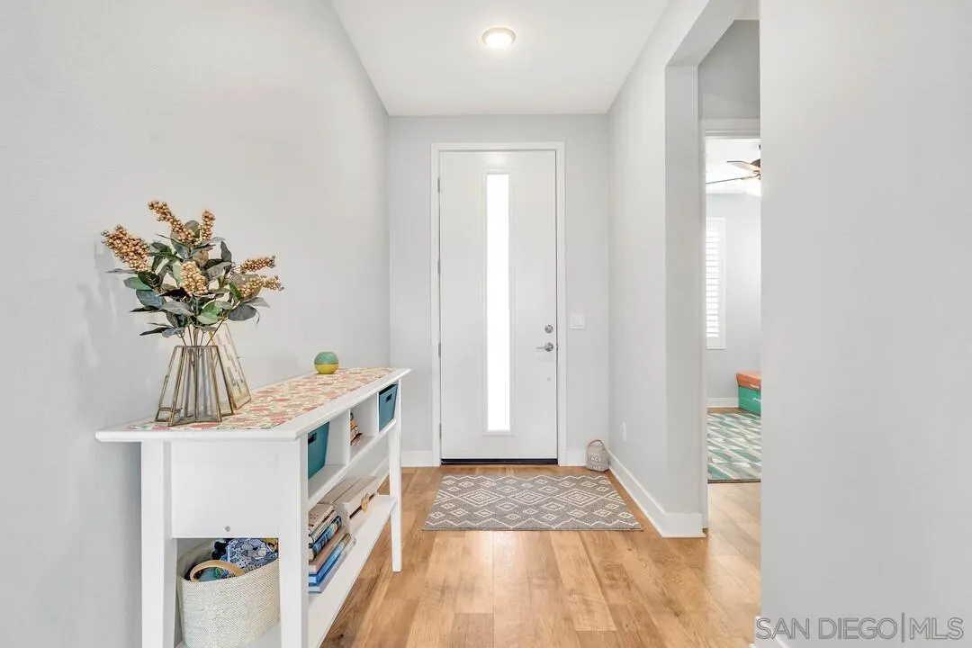 8869 Trailridge Avenue Santee, CA 92071 - Photo 25 of 48 a room with furniture and a potted plant