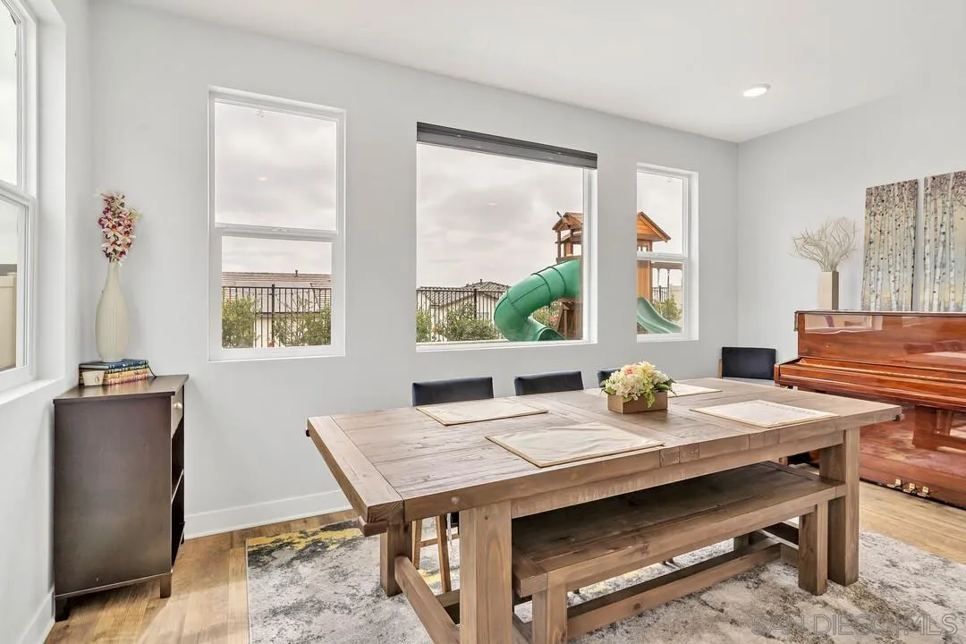 8869 Trailridge Avenue Santee, CA 92071 - Photo 28 of 48 a view of a dining room with furniture window and outside view