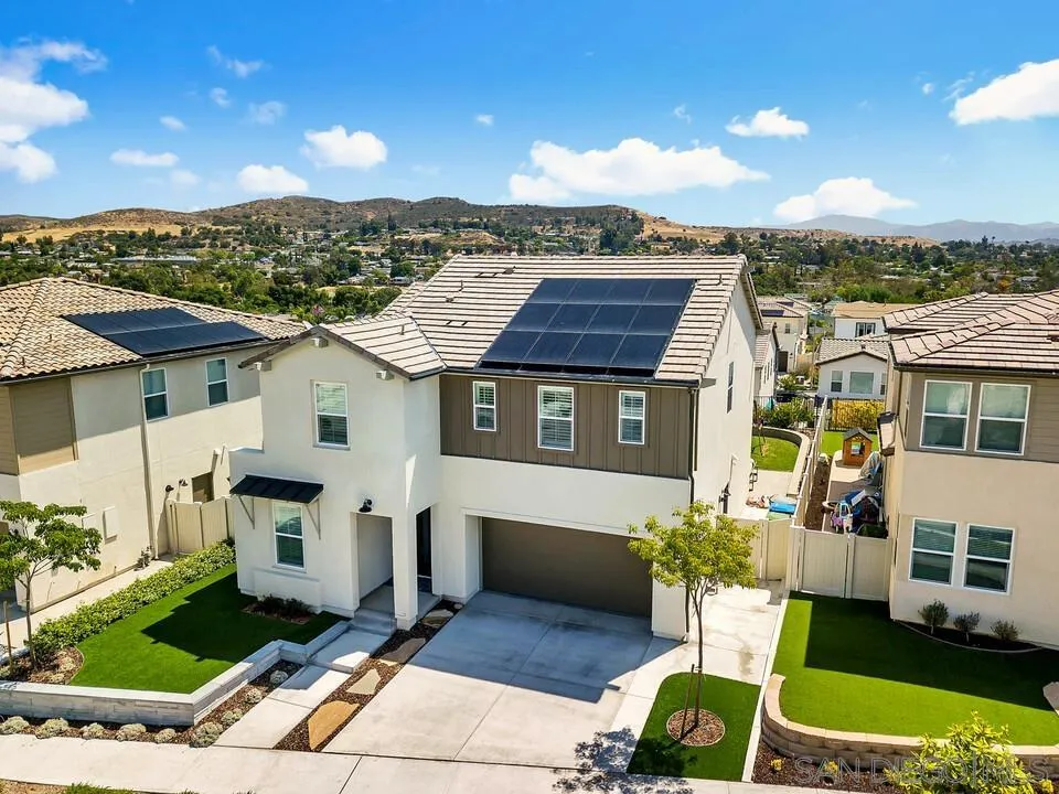 8869 Trailridge Avenue Santee, CA 92071 - Photo 42 of 48 a view of a house with a yard and sitting area