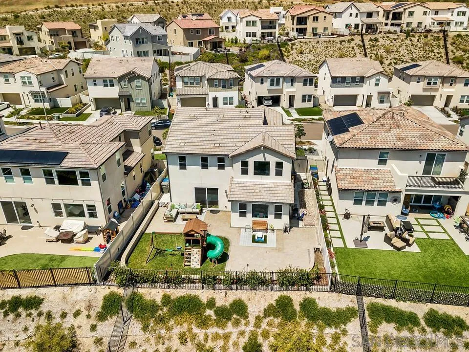 8869 Trailridge Avenue Santee, CA 92071 - Photo 48 of 48 an aerial view of residential houses with outdoor space and parking
