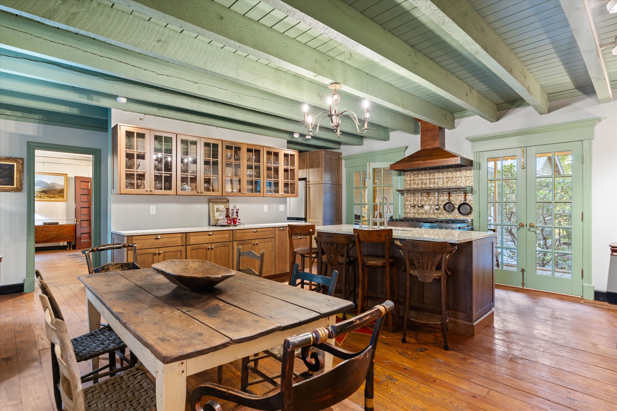 5180 Fire Tower Road Franklin, TN 37064 - Photo 22 of 82 a living room with a table chairs and a wooden floor