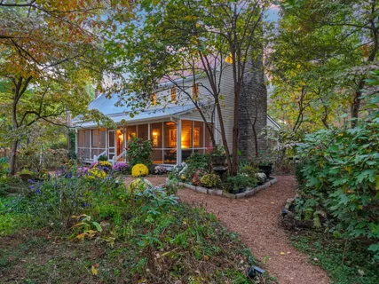 a backyard of a house with lots of green space