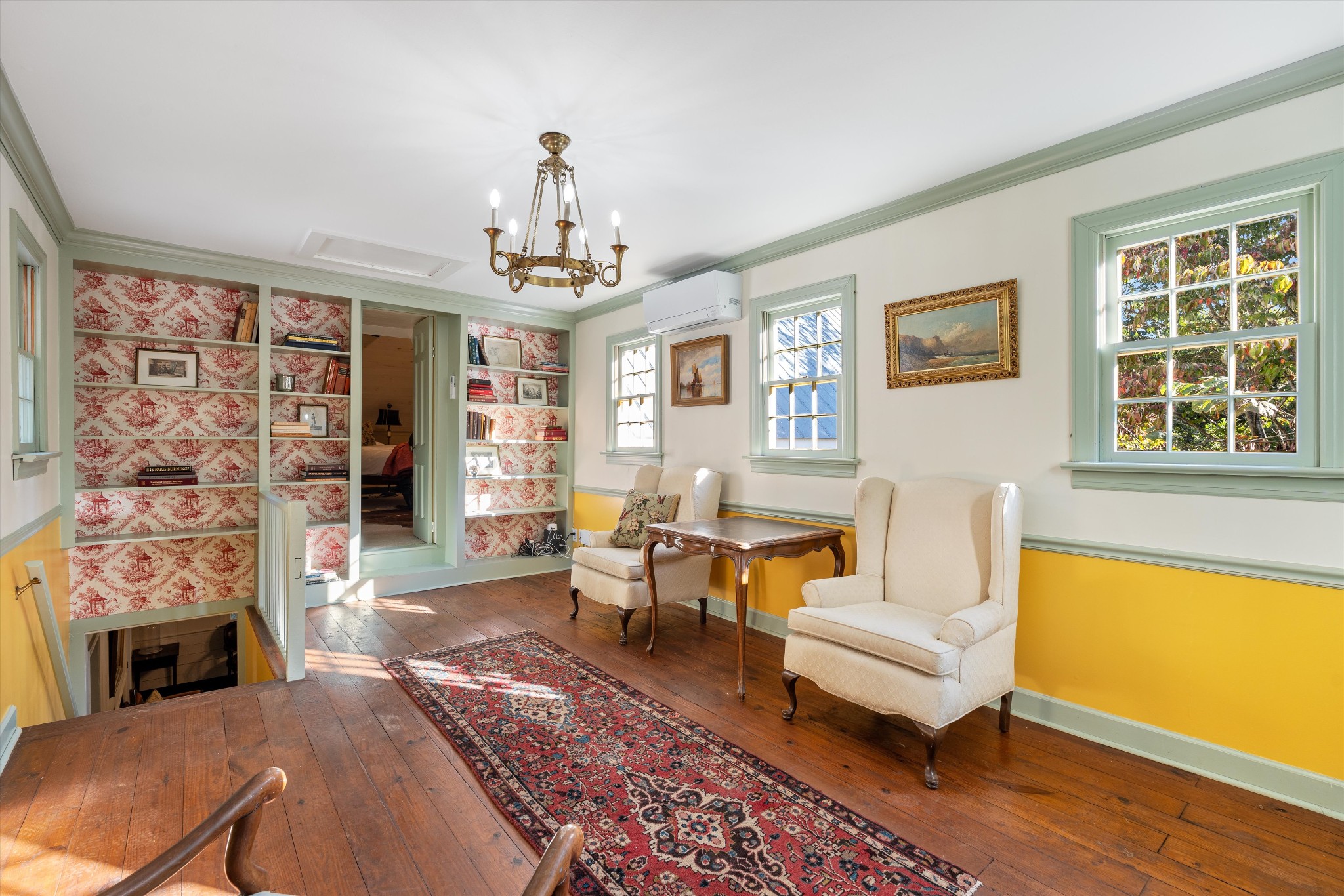 5180 Fire Tower Road Franklin, TN 37064 - Photo 40 of 98 a living room with furniture a fireplace and a floor to ceiling window