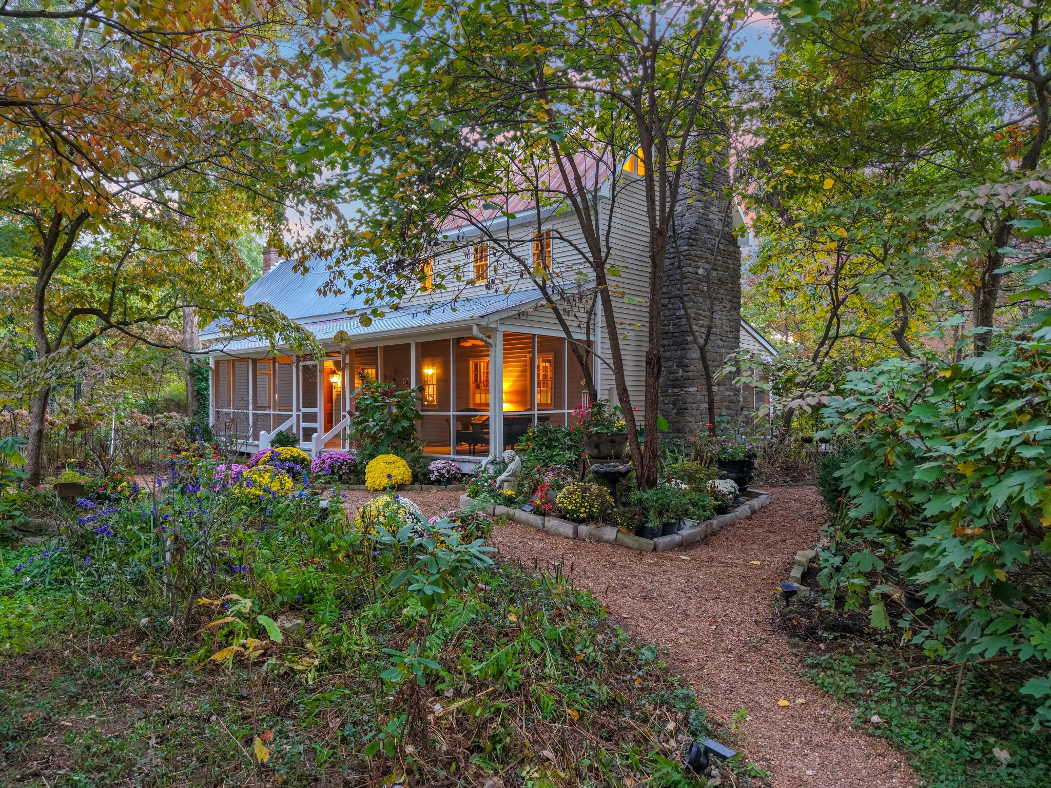 5180 Fire Tower Road Franklin, TN 37064 - Photo 4 of 98 a view of a house with patio and garden
