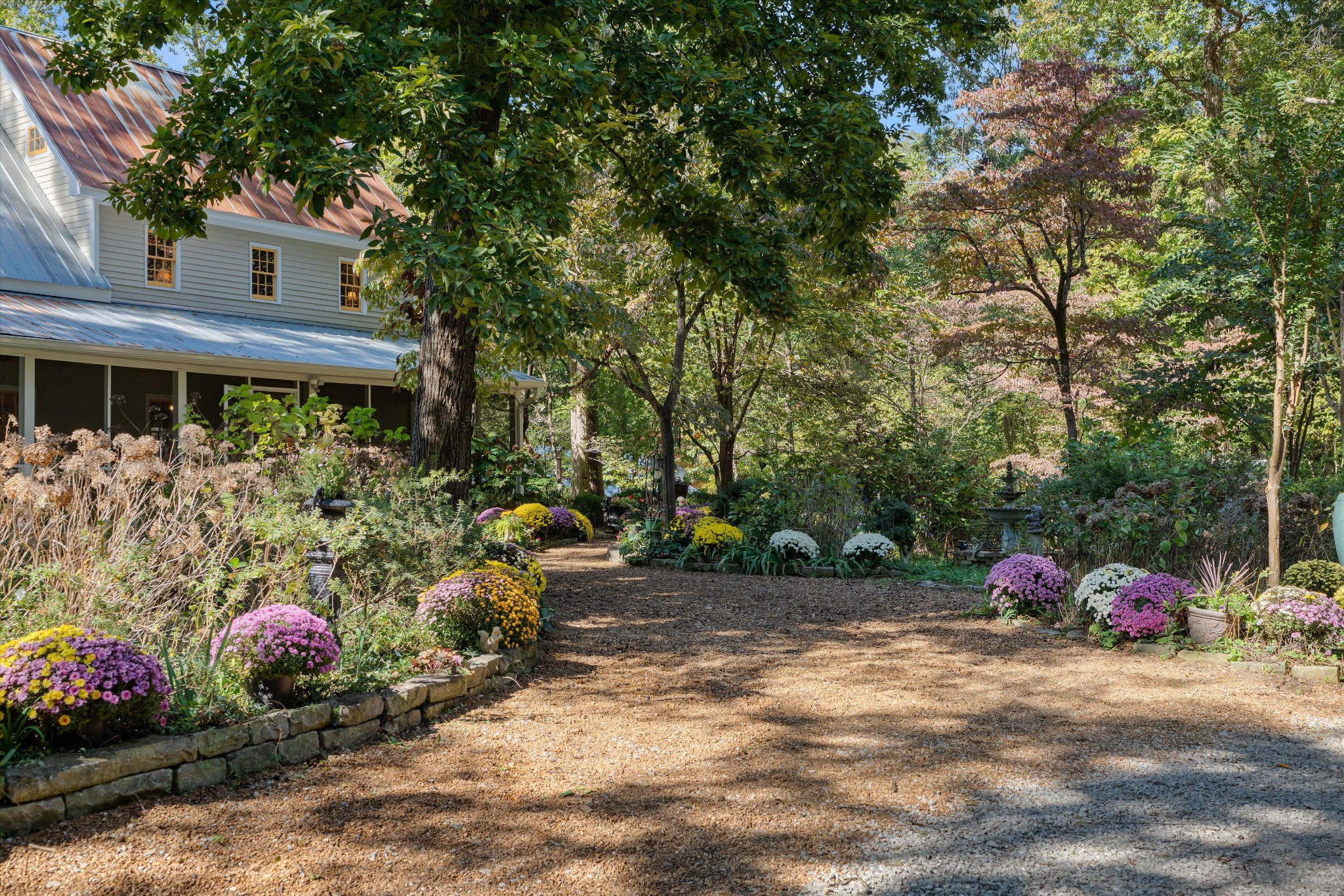 5180 Fire Tower Road Franklin, TN 37064 - Photo 8 of 82 a backyard of a house with lots of green space and fountain