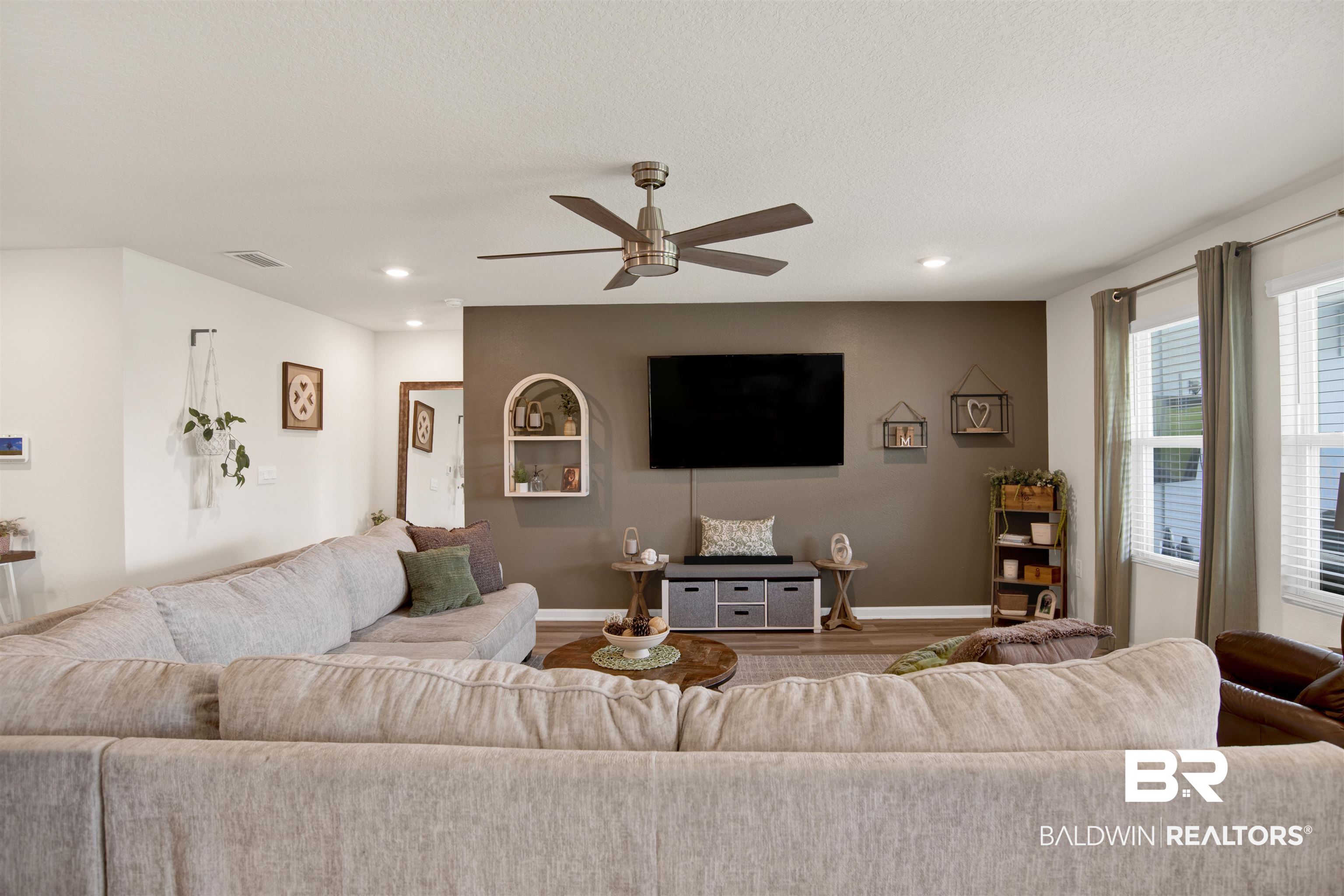 22301 Early Dawn Circle Foley, AL 36535 - Photo 31 of 45 Spacious living area featuring wood-finish flooring, recessed lighting, and a modern ceiling fan