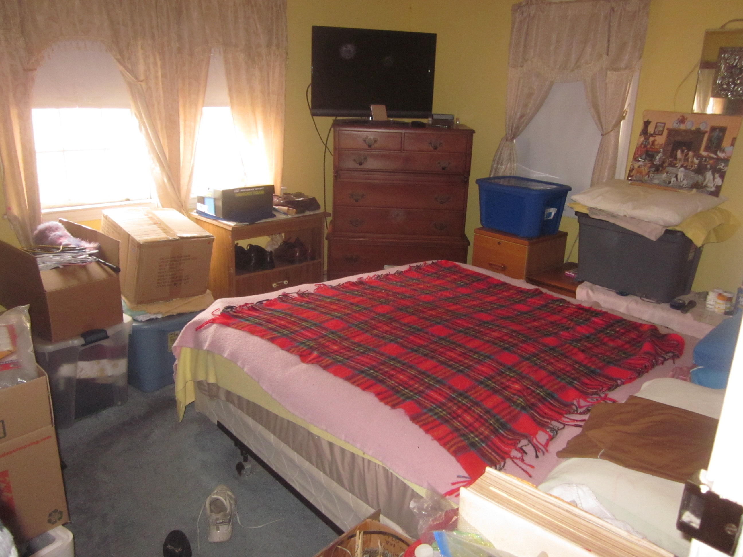 34 Franbill Road Hyannis, MA 02601 - Photo 7 of 14 a bedroom with a bed and flat screen tv