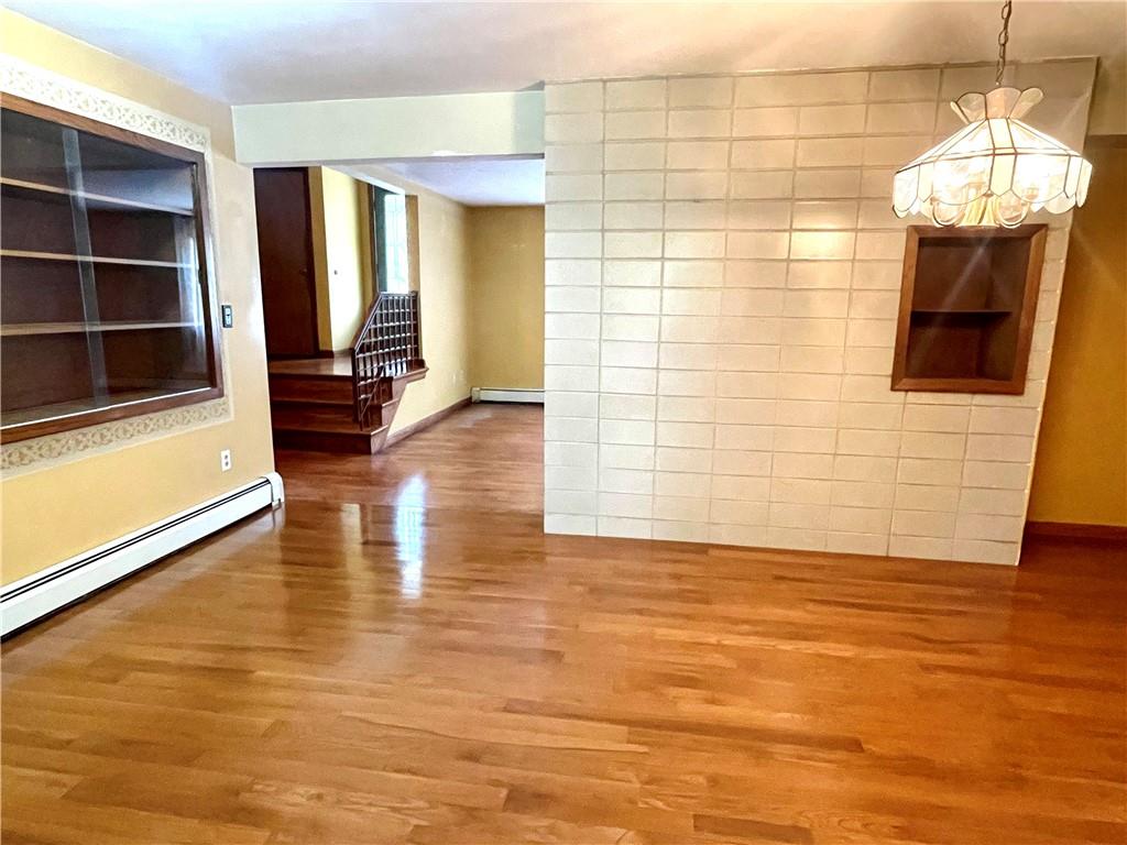 472 West Sunbury Road Butler, PA 16001 - Photo 16 of 39 a view of a livingroom with wooden floor