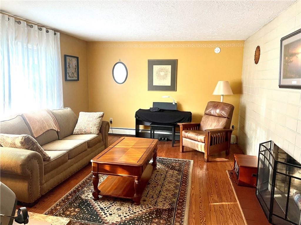 472 West Sunbury Road Butler, PA 16001 - Photo 4 of 39 a living room with furniture and a rug