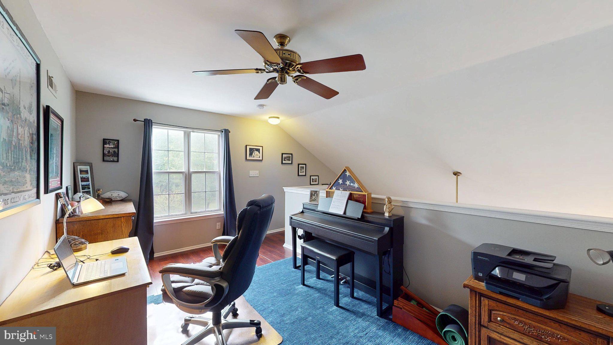 1008 B Ralston Drive Mount Laurel, NJ 08054 - Photo 8 of 29 a view of a workspace with furniture and a window