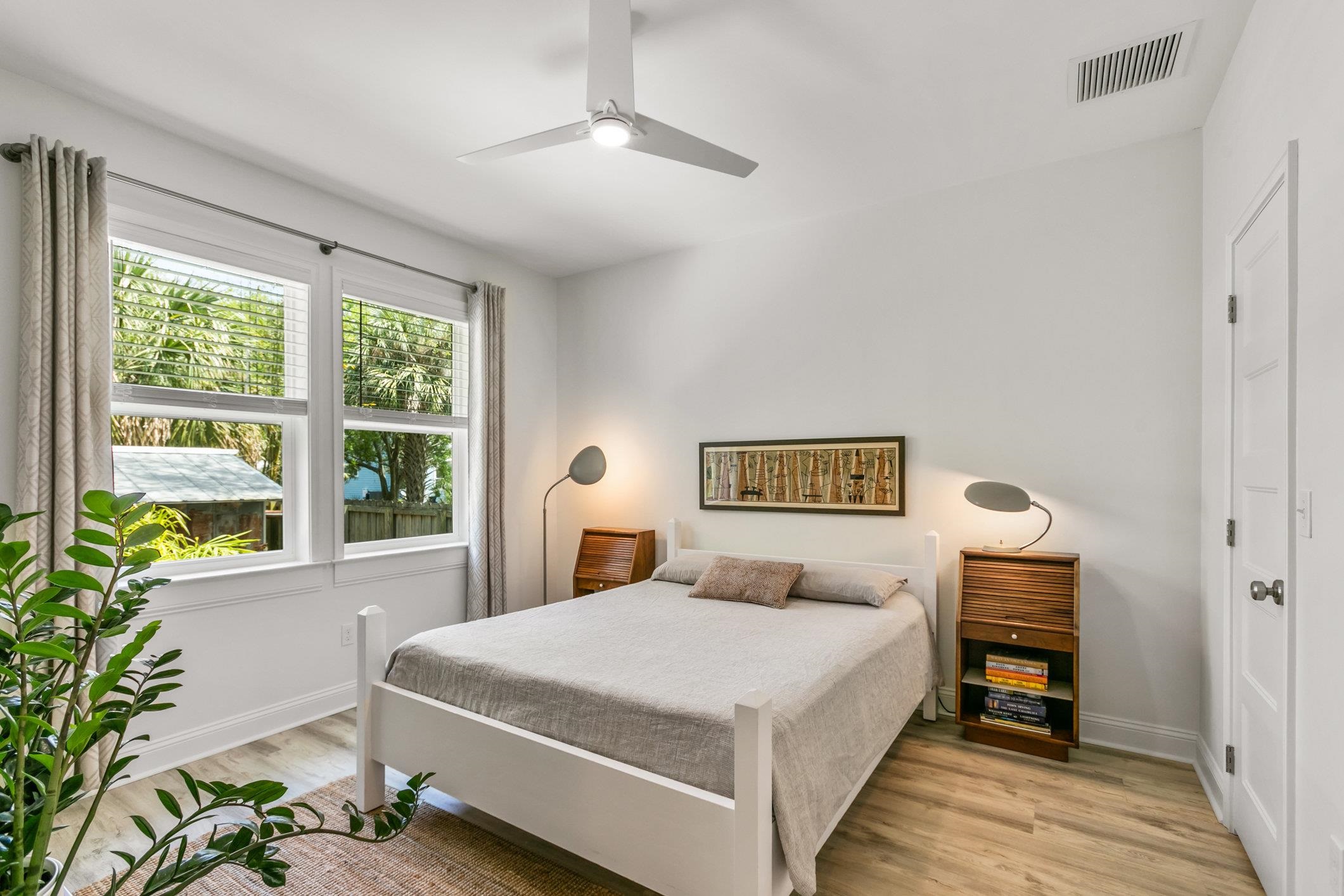 249 Riberia Street St. Augustine, FL 32084 - Photo 14 of 45 a bedroom with a large bed and a window