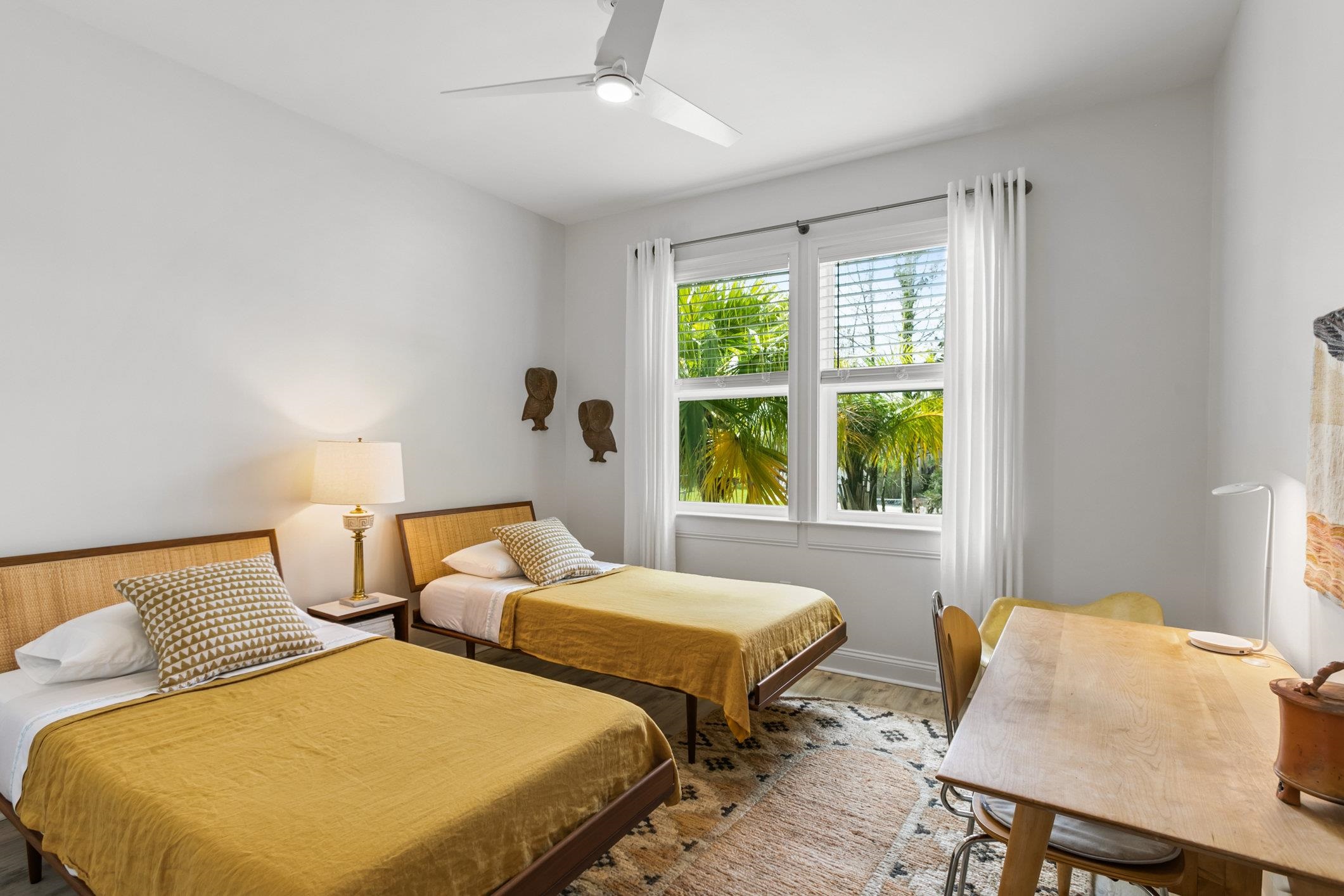 249 Riberia Street St. Augustine, FL 32084 - Photo 20 of 45 a bedroom with two beds and a table