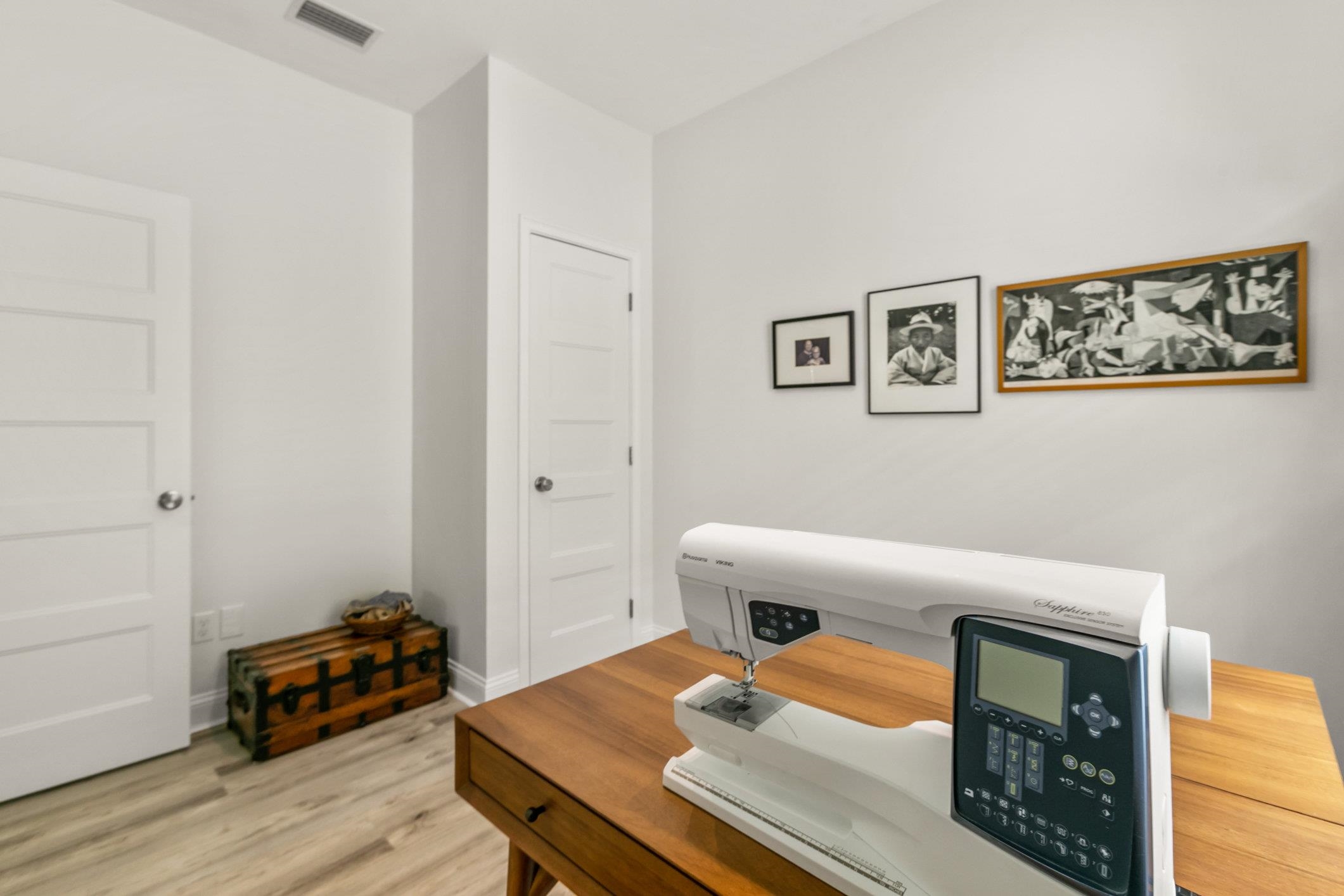 249 Riberia Street St. Augustine, FL 32084 - Photo 25 of 45 a bedroom with a bed and wooden floor