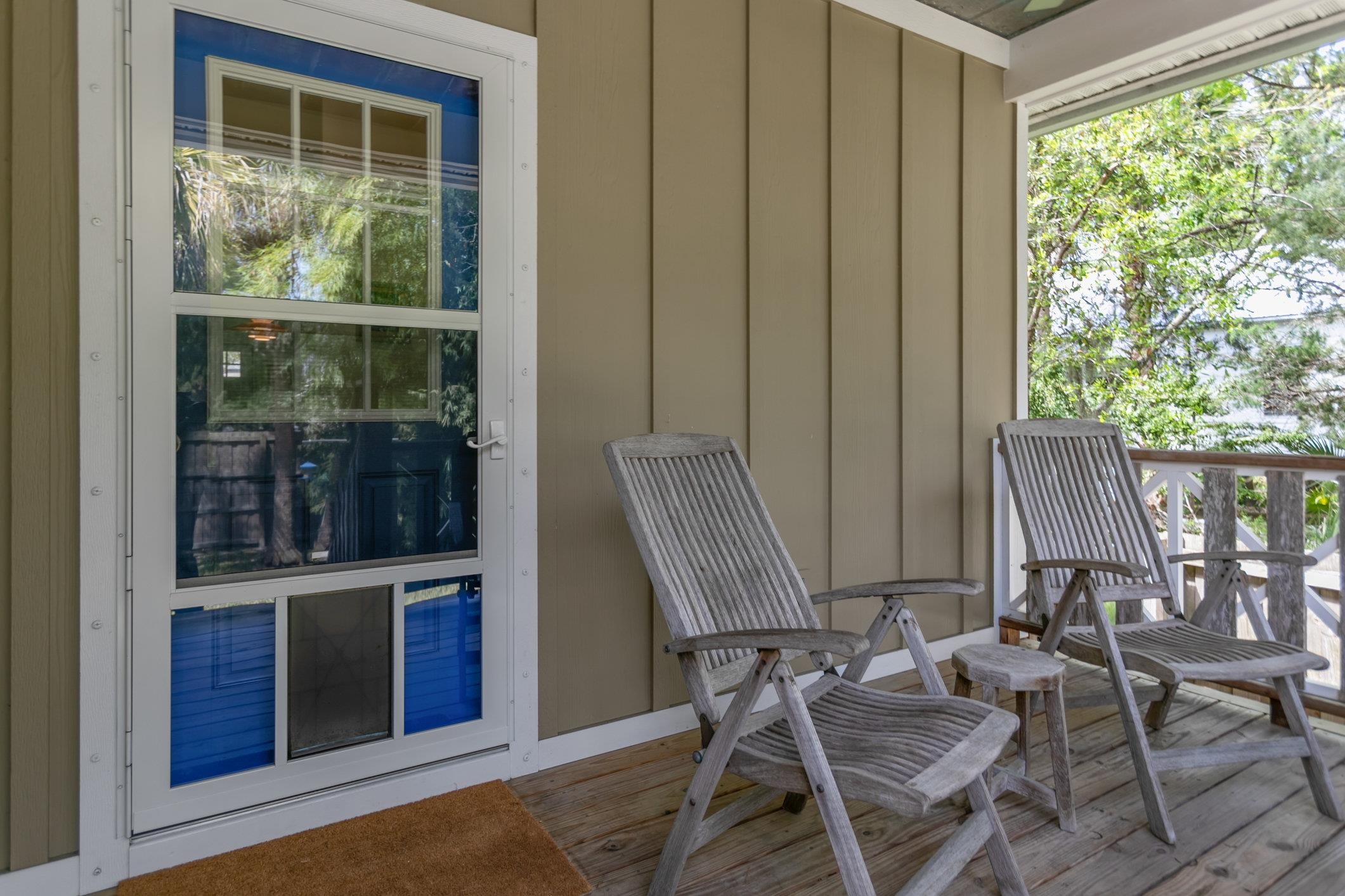 249 Riberia Street St. Augustine, FL 32084 - Photo 30 of 45 a view of a chair and table in backyard of house