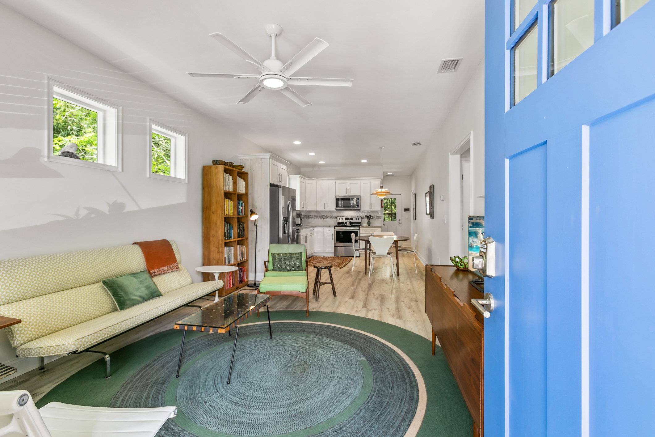 249 Riberia Street St. Augustine, FL 32084 - Photo 3 of 45 a living room with furniture and kitchen view