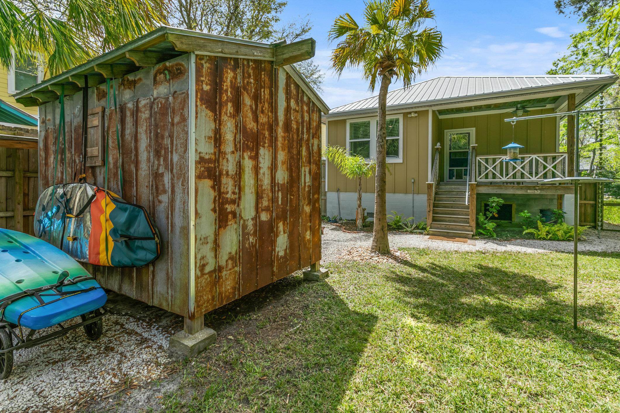 249 Riberia Street St. Augustine, FL 32084 - Photo 38 of 45 a front view of a house with garden