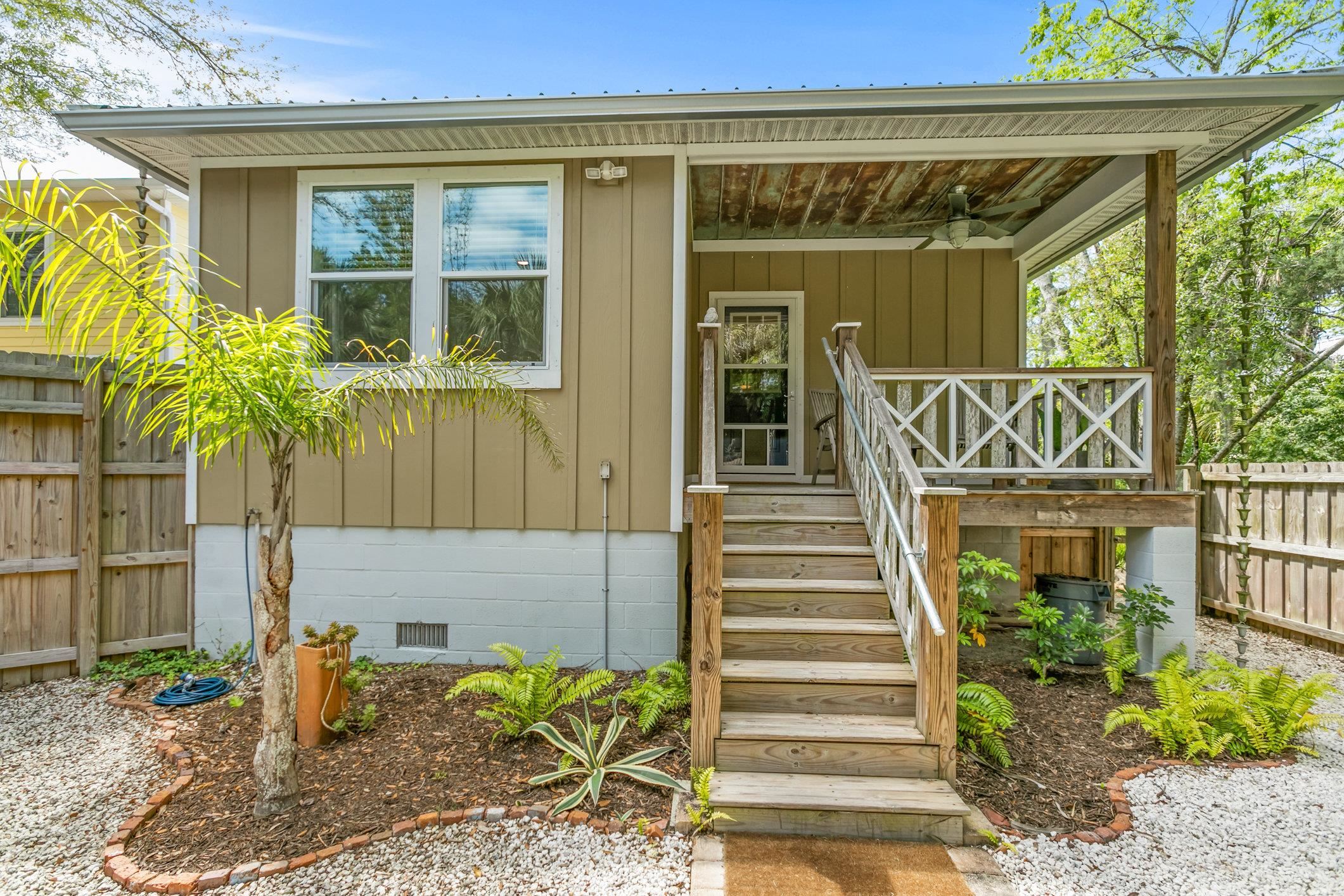 249 Riberia Street St. Augustine, FL 32084 - Photo 42 of 45 a front view of a house with a garden