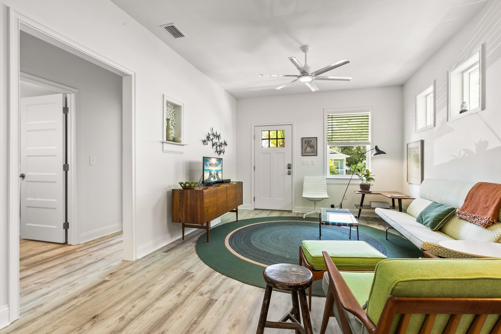 249 Riberia Street St. Augustine, FL 32084 - Photo 6 of 45 a living room with furniture and a wooden floor