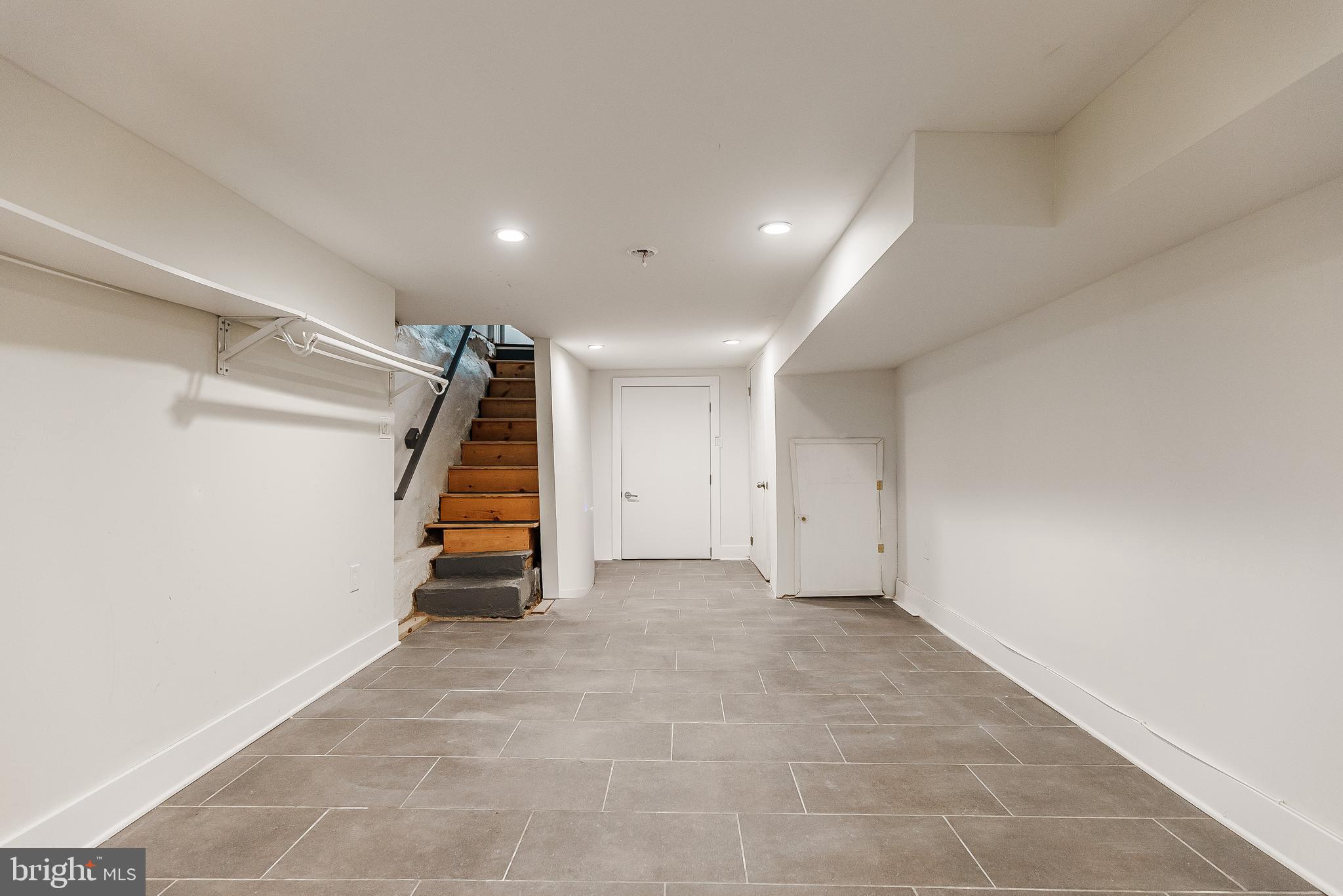 1331 South Dover Street Philadelphia, PA 19146 - Photo 13 of 24 a view of a room with stairs