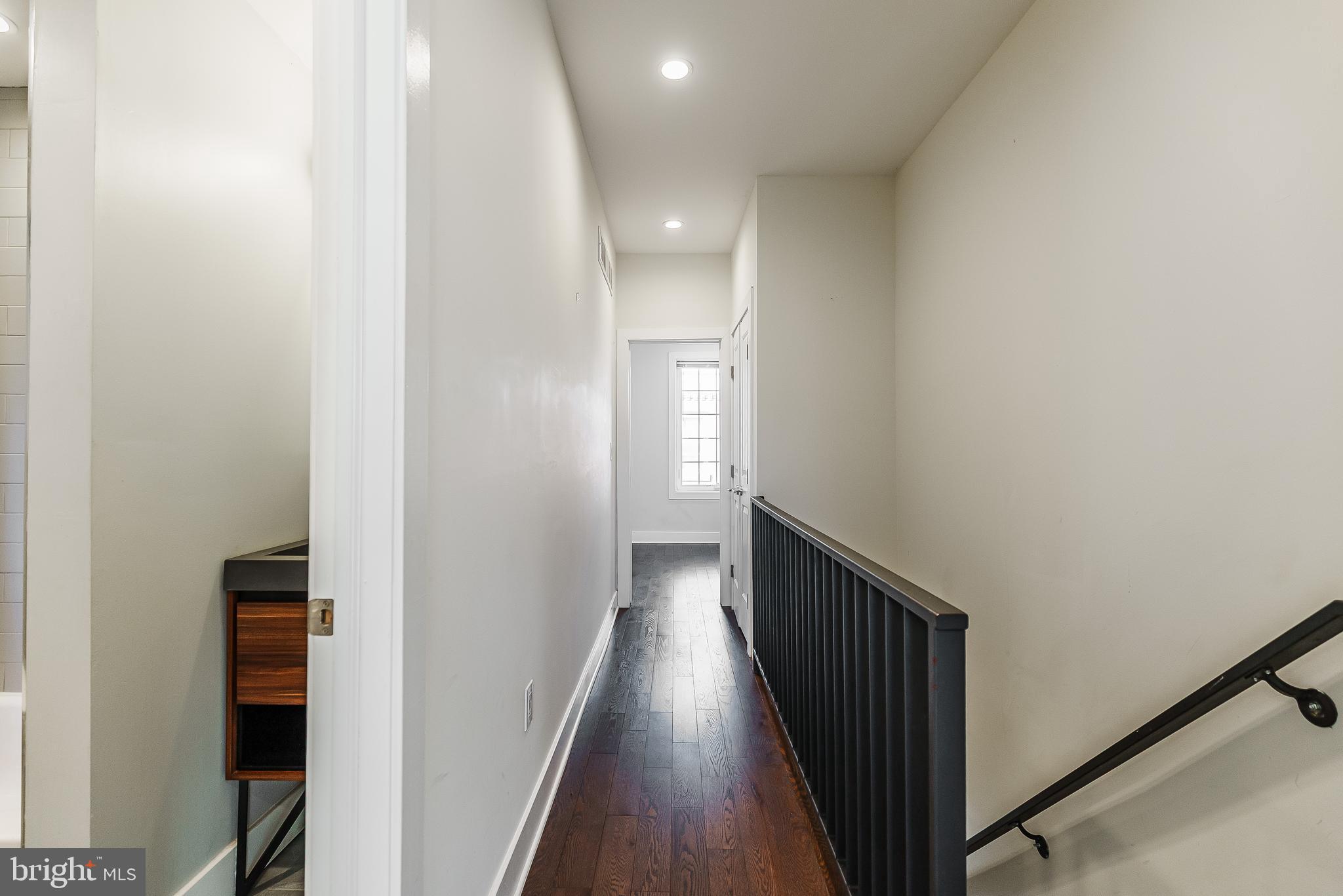 1331 South Dover Street Philadelphia, PA 19146 - Photo 15 of 24 a view of a hallway with wooden floor