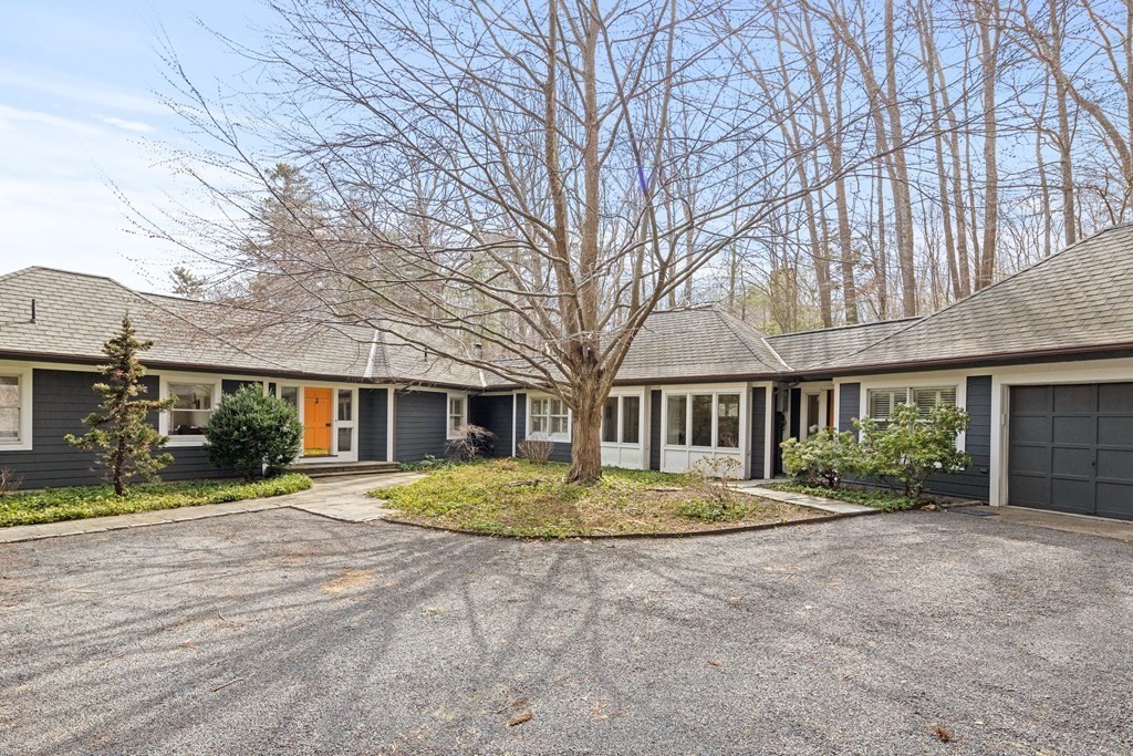 15 Forster Road Manchester, MA 01944 - Photo 2 of 42 a front view of a house with a yard