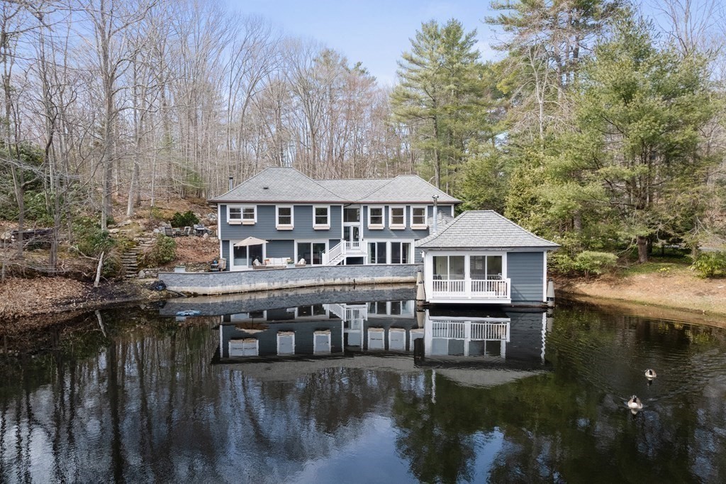 15 Forster Road Manchester, MA 01944 - Photo 41 of 42 a view of a house with pool and lake view