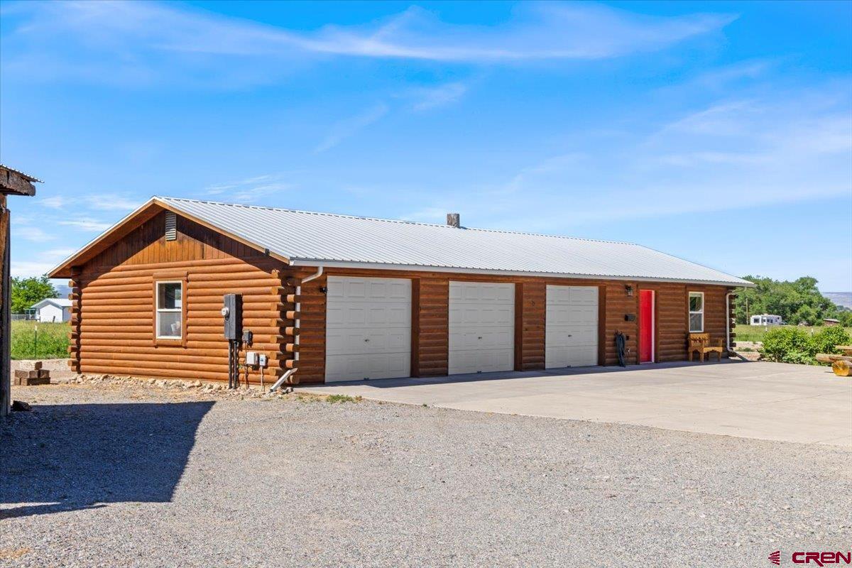 2083 Pioneer Road Delta, CO 81416 - Photo 36 of 45 a view of a house with a yard