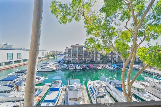 a view of yard from terrace with seating area