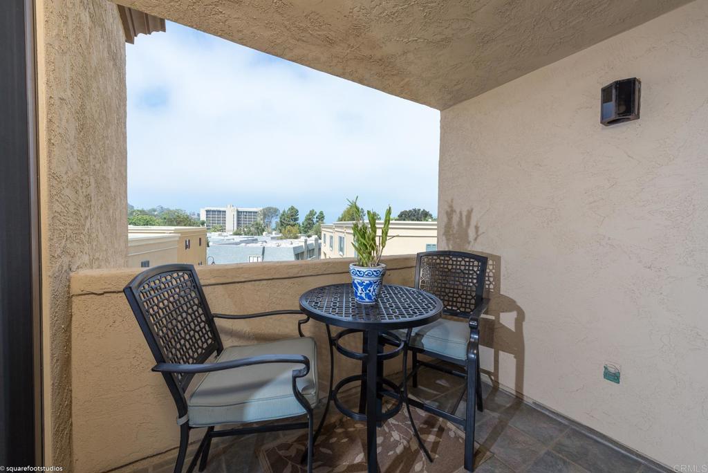2420 Torrey Pines Road La Jolla, CA 92037 - Photo 12 of 21 a view of a dining room with furniture and a potted plant