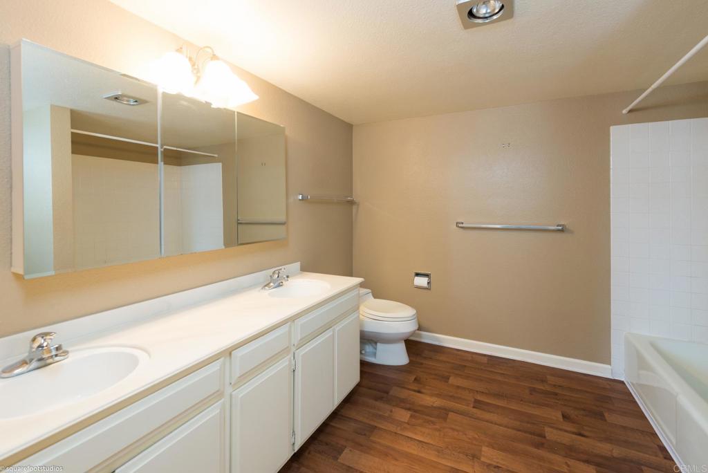 2420 Torrey Pines Road La Jolla, CA 92037 - Photo 14 of 21 a bathroom with a sink and a mirror