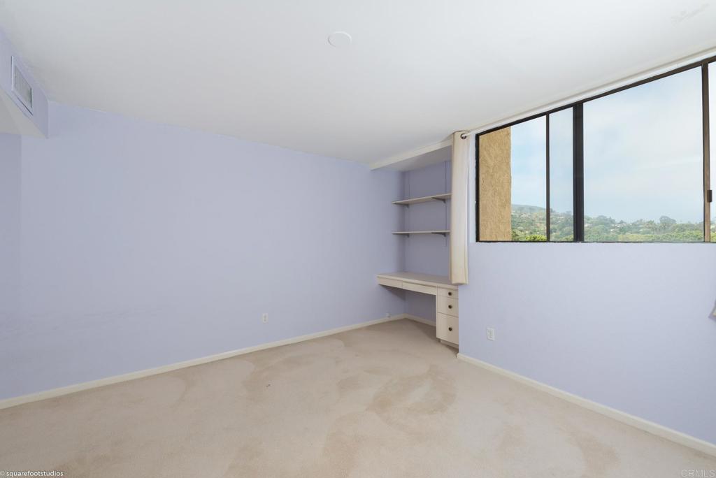 2420 Torrey Pines Road La Jolla, CA 92037 - Photo 16 of 21 a view of an empty room with a window