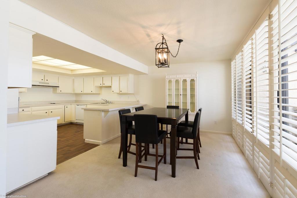2420 Torrey Pines Road La Jolla, CA 92037 - Photo 5 of 21 a kitchen with a table and chairs in it