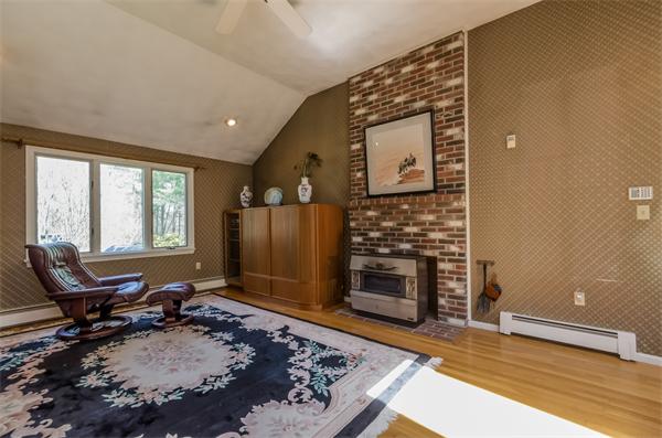 126 North Branch Road Concord, MA 01742 - Photo 11 of 22 a living room with furniture and a fireplace