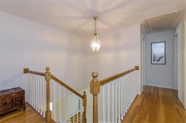 126 North Branch Road Concord, MA 01742 - Photo 15 of 22 a view of a hallway with wooden floor and stairs